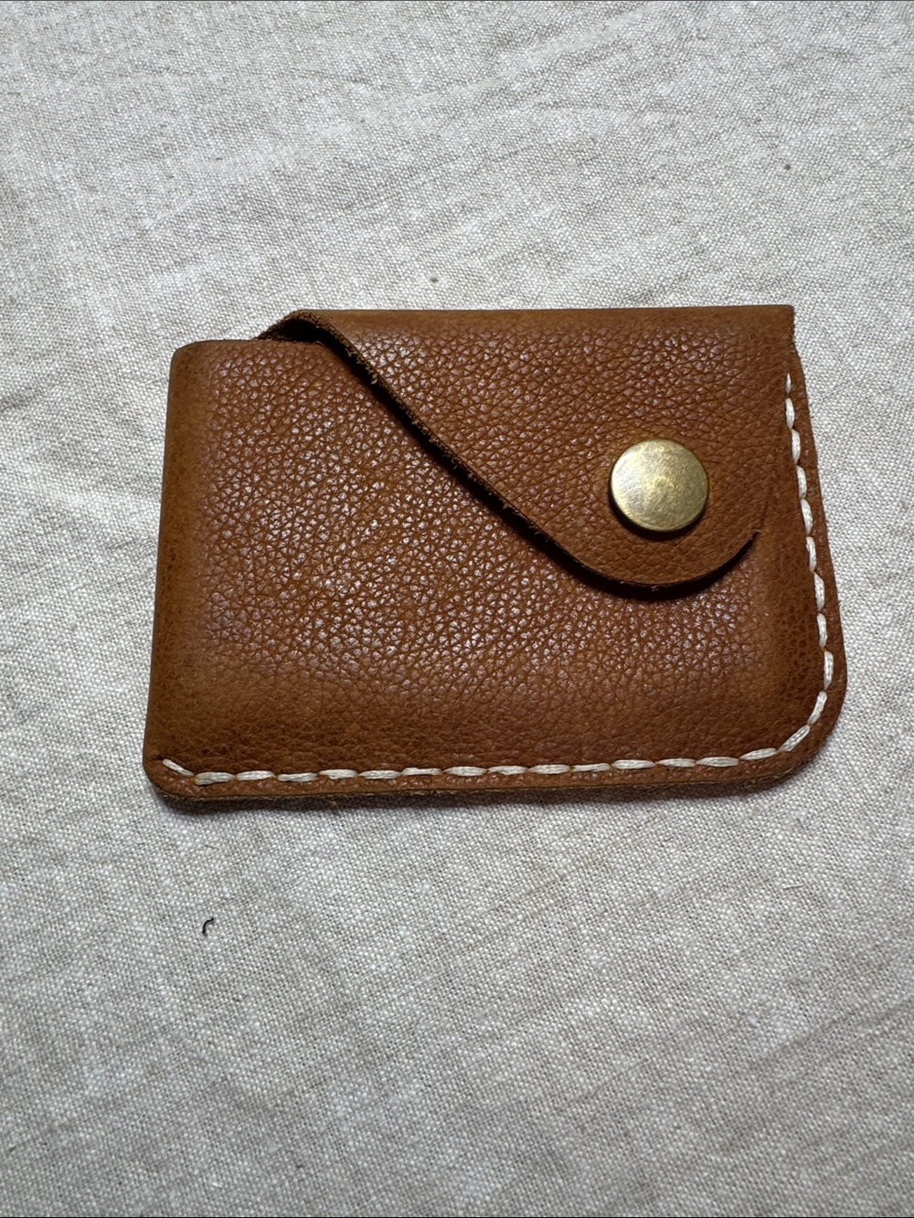 Leather card holder with metal snap. 4x3